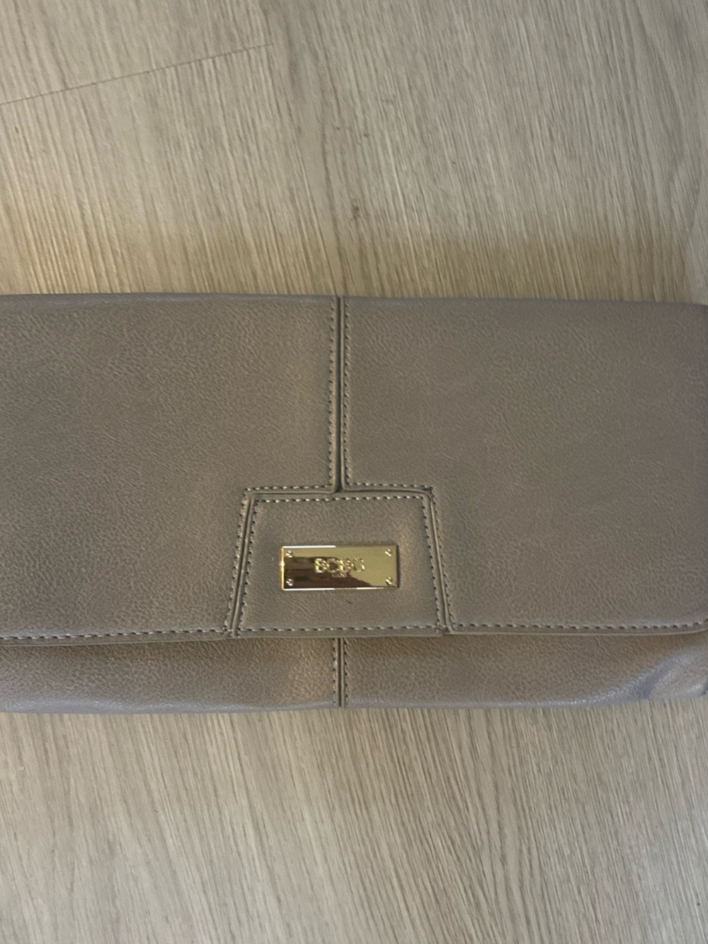 BCBG Taupe Fold-Over Clutch with Gold Plaque